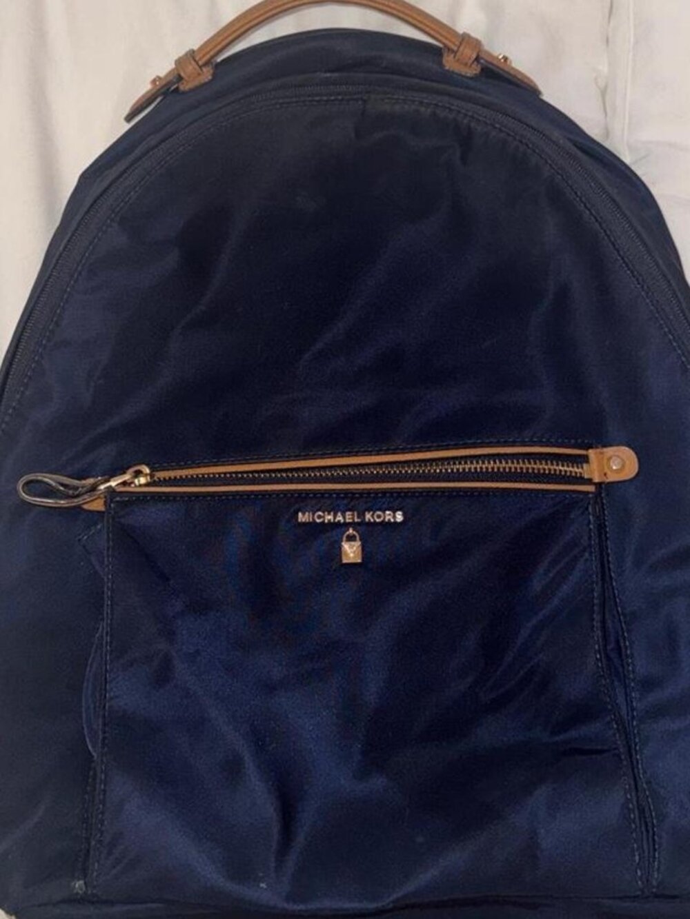 MICHAEL KORS navy blue backpack with brown leather trim & gold zippers